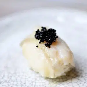 Black tobiko on nigiri sushi