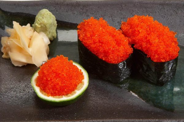 Orange tobiko wrapped in nori